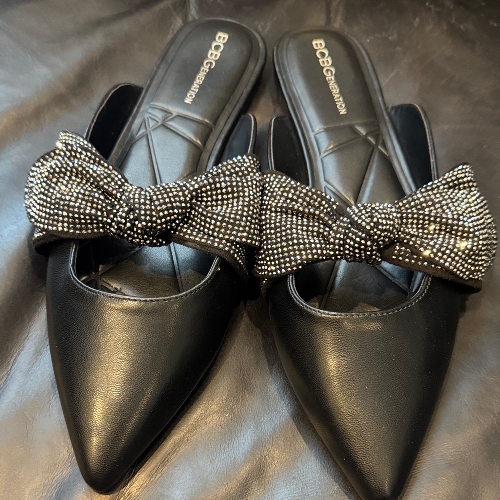 BCBGeneration Black Pointed-Toe Slip-On Mules with Jeweled Bow